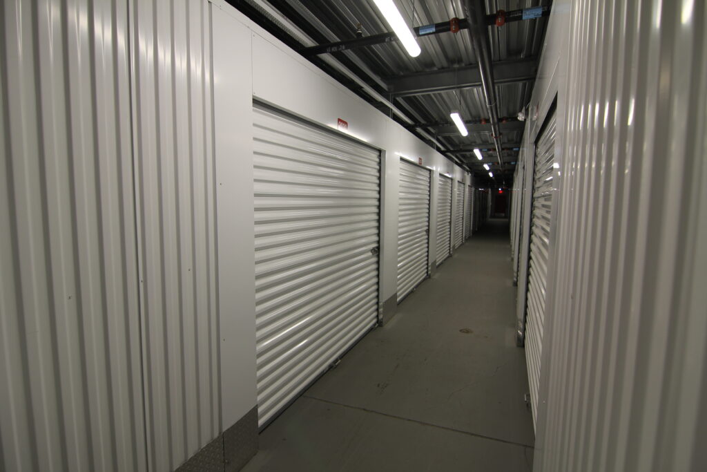 Wide interior hallway with clean floors at OpenSpace climate controlled storage Jeannette